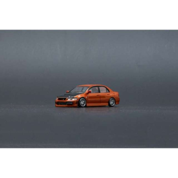 Mitsubishi Lancer Evo VII 2001 LHD custom orange - skala 1:64 - BM Creation